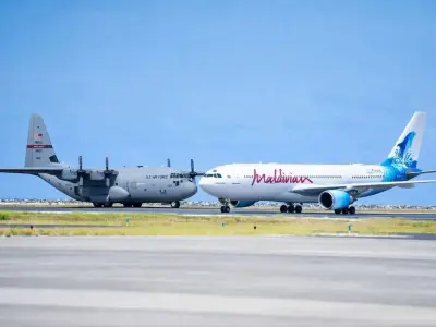 މުއިއްޒު ހުރި ގޮތް އެންމެ ރަނގަޅަށް ދައްކުވައިދޭ 1 ގަނޑު ފޮޓޯ